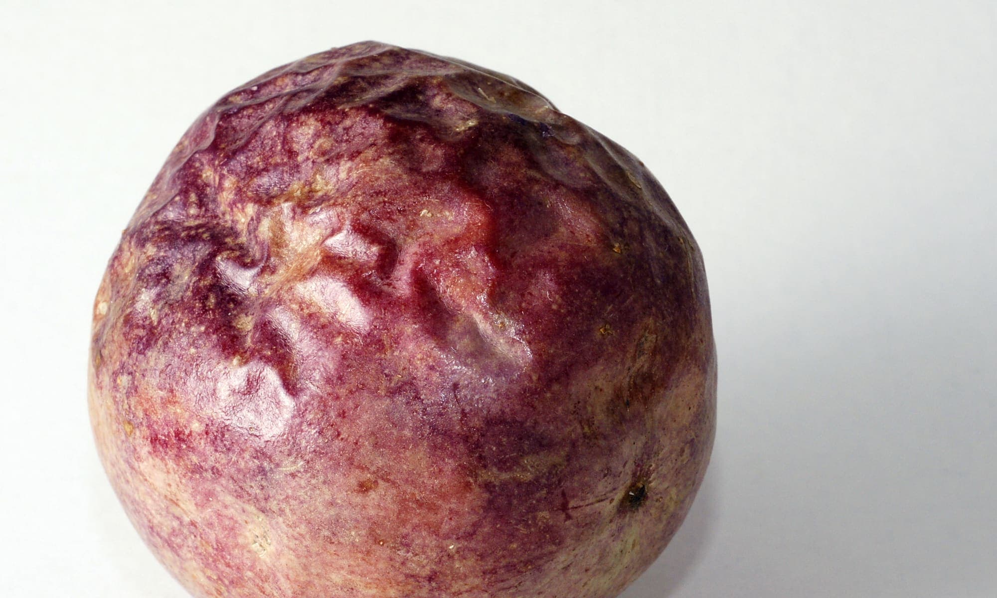 Whole passion fruit on the vine
